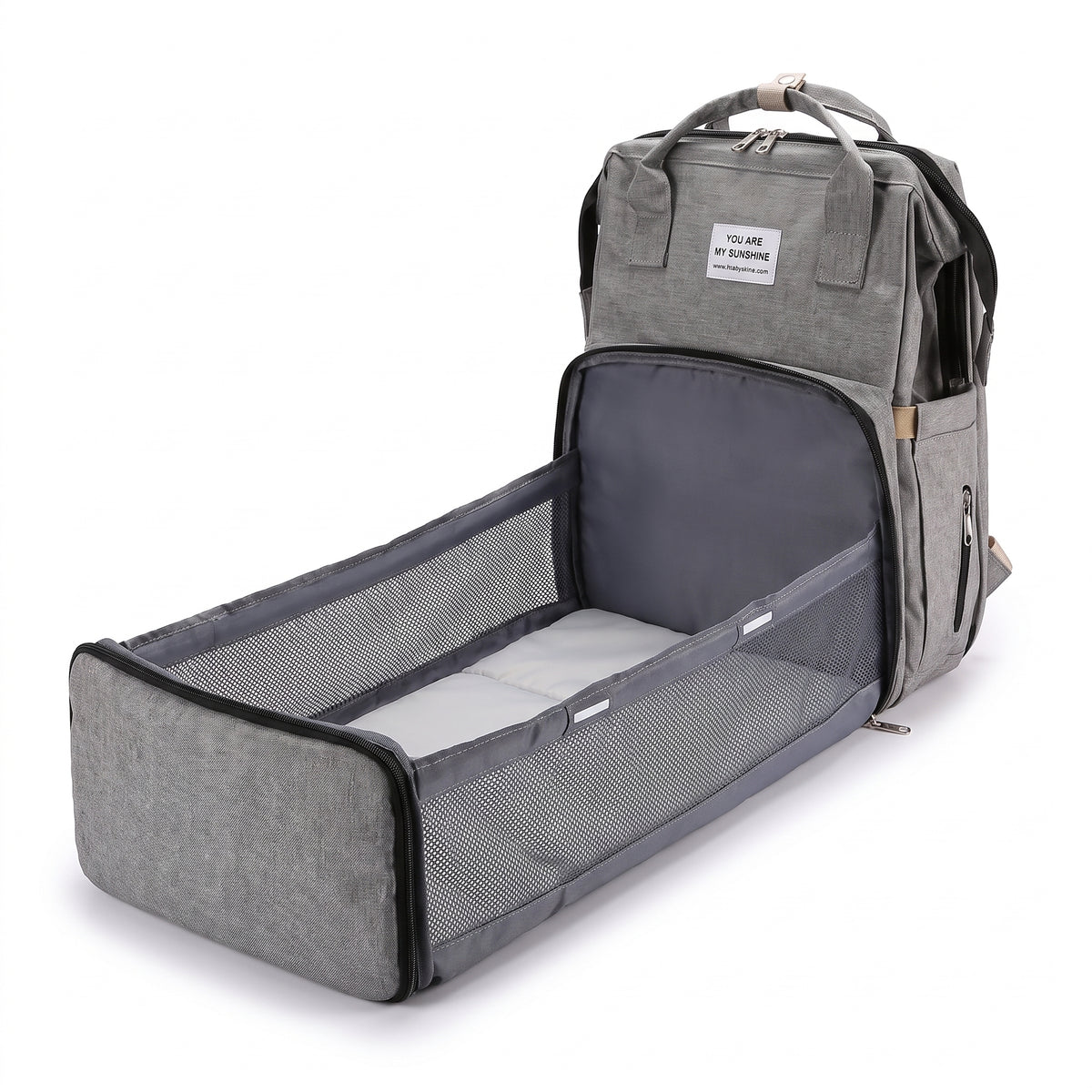 Sac à langer déplié en lit de voyage