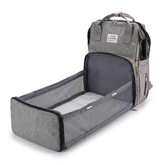 Sac à langer déplié en lit de voyage