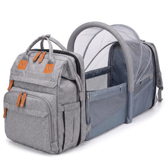 Sac déplié en lit avec pare-soleil et moustiquaire