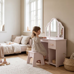 Coiffeuse enfant rose avec un enfant