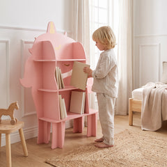 Bibliothèque enfant licorne rose avec un enfant